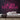 La Vie Est Belle Neon Sign — Pink neon (room)